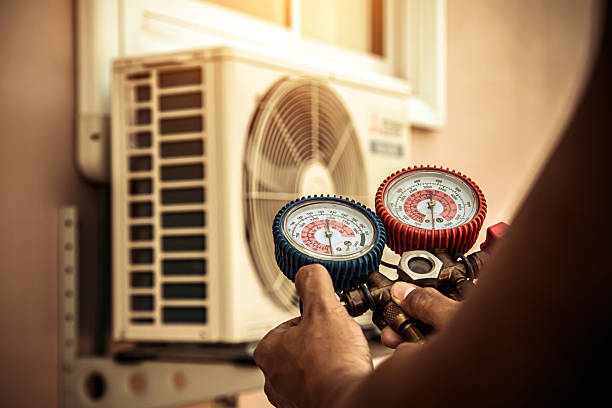 Professional Air Conditioning Service technician working in Fairview Village, PA